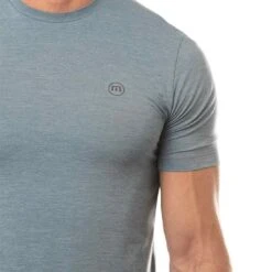 TravisMathew Scenic Vista Active Tee -Golf Shop travismathew scenic vista active tee heather copen blue logo itempicture